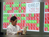 Japan's Nikkei ends slightly higher; dim corporate outlook dulls Sony's shine