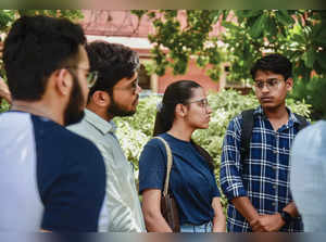 New Delhi, June 13 (ANI): Students wait during the Supreme Court hearing on the ...