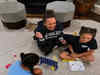 Kamala Harris smiles with a glass of wine and plays with her niece's daughters after she lost U.S elections to Trump