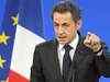 French President Sarkozy downplays S&P downgrade