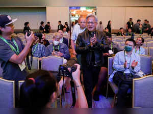 FILE PHOTO: Nvidia CEO Jensen Huang arrives at an event at COMPUTEX forum in Taipei