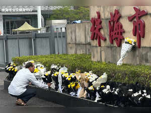 Silence descends around China’s deadliest mass killing in years as flowers cleared away