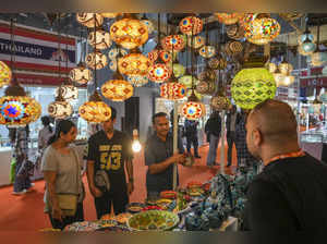 New Delhi: Visitors at a stall at the India International Trade Fair at Pragati ...