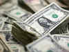 Dollar notches weekly gain as traders reassess rate cut expectations