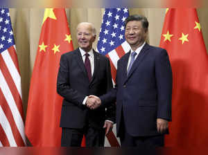 In a meeting with Biden, China's Xi cautions US to 'make the wise choice' to keep relations stable