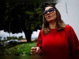 Brazil's first Lady Rosangela "Janja" da Silva talks with journalists in front of the Alvorada Palace, as  Brazilian President Luiz Inacio Lula da Silva recovers from a head injury suffered at home that caused a minor brain hemorrhage, in Brasilia