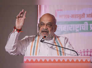 Mumbai: Union Minister and BJP leader Amit Shah speaks during the release of par...