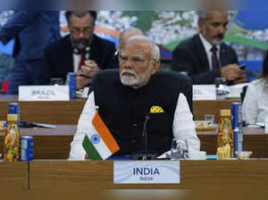 Indian's Prime Minister Narendra Modi, center, and other G20 leaders attend the ...