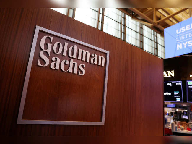 FILE PHOTO: The logo for Goldman Sachs is seen on the trading floor at the New York Stock Exchange (NYSE) in New York City