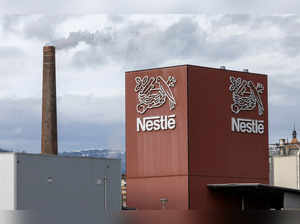 FILE PHOTO: A logo of food giant Nestle is seen in a building in Orbe