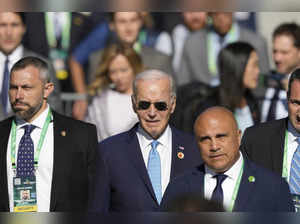 After being relegated to the back corner of the APEC group photo, Biden now misses the G20 group photo; what was he doing?