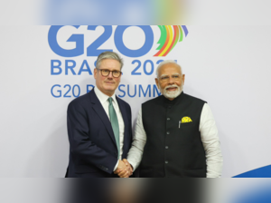 PM Modi with PM Starmer.