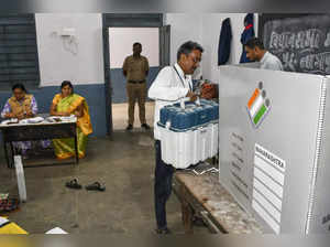 Preparations underway at a polling booth on the eve of the Maharashtra A...