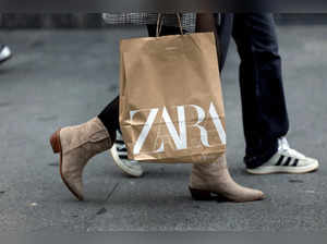 FILE PHOTO: A woman carries a bag from Spanish multinational retail clothing chain Zara, in Bilbao