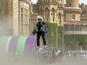 Bengaluru: An exhibitor demonstrates a jet suit during an exhibition at the Beng...