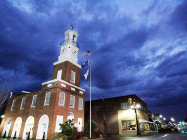 Storm clouds cover the sky at the Town Clock polling station