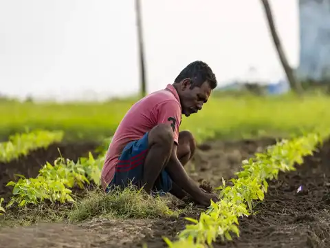 How can farmers register for PM KISAN?
