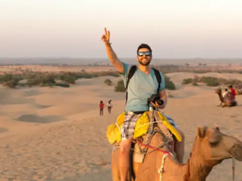 Camel ride at the sand dunes