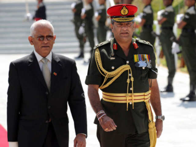 Sri Lanka's army chief walks with Secretary to Sri Lankan President