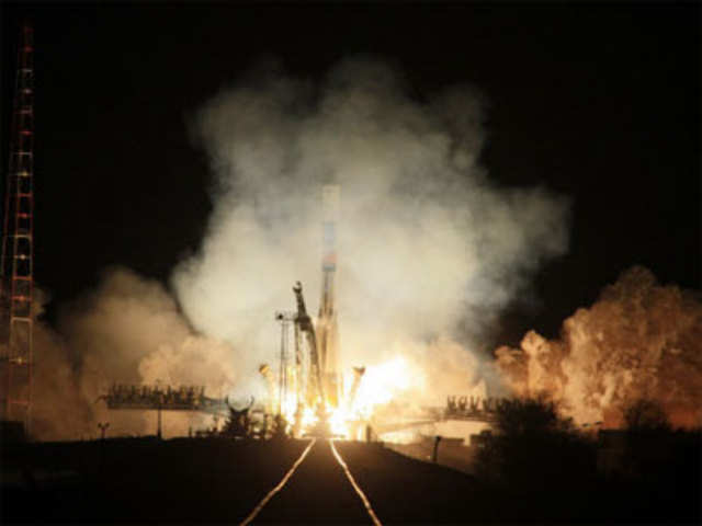 Russia's Soyuz-U booster blasts off a launch pad