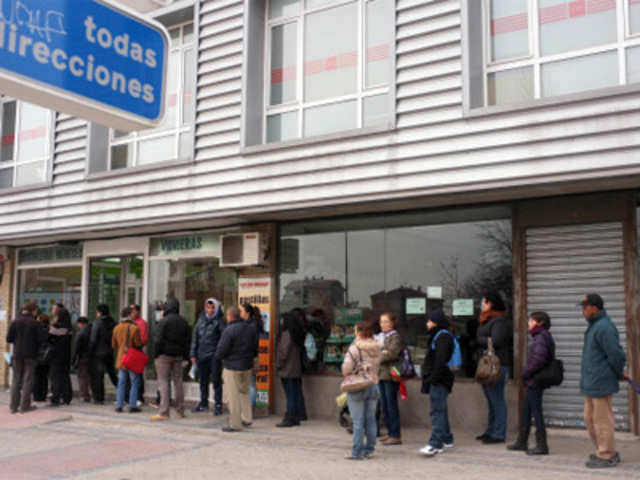 People at employment office in Madrid suburb