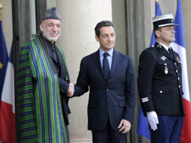 Sarkozy with Hamid Karzai in Paris
