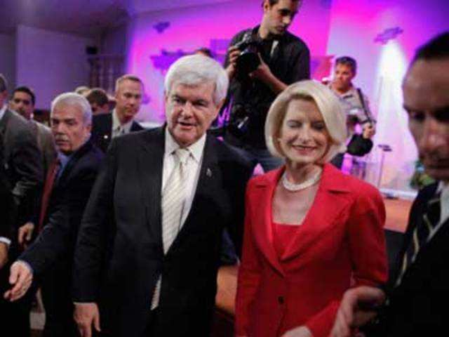 Republican presidential candidate Newt Gingrich prepare to meet supporters