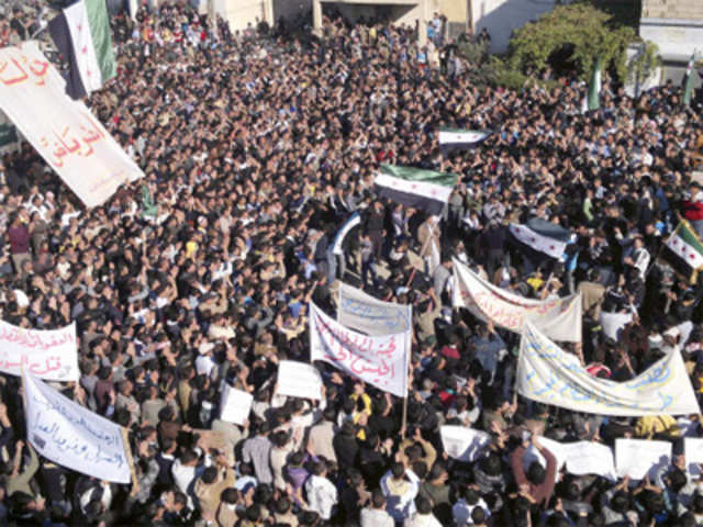 Demonstrators protest against Syria President