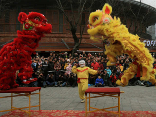 A Lion dance troupe entertains residents of a neighbourhood in Wuhan, China