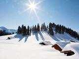 Snow covered huts on Maiensaess Lafet mountain