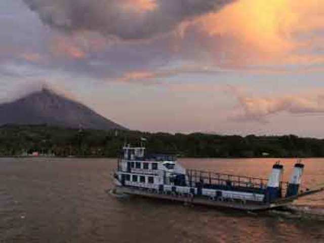 A ferry arrives at the harbor of the Ometepe Island in Nicaragua