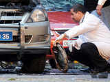 Investigators work at the blast scene