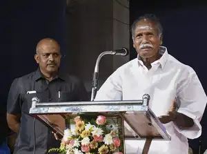 Puducherry: Chief Minister N Rangasamy addresses a program, in Puducherry, Oct. ...