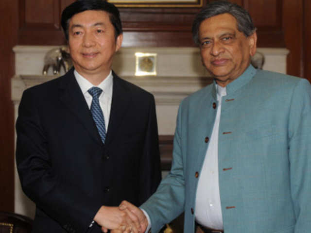Governor of Qinghai Province of China shakes hand with SM Krishna
