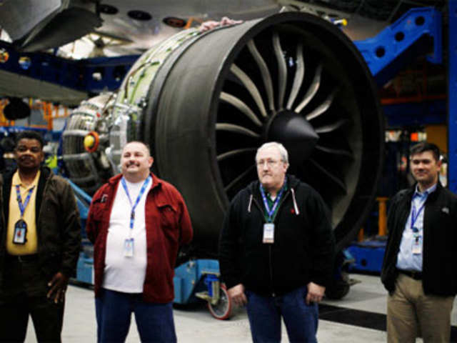 Assembly line employees at Boeing production facility in Everett