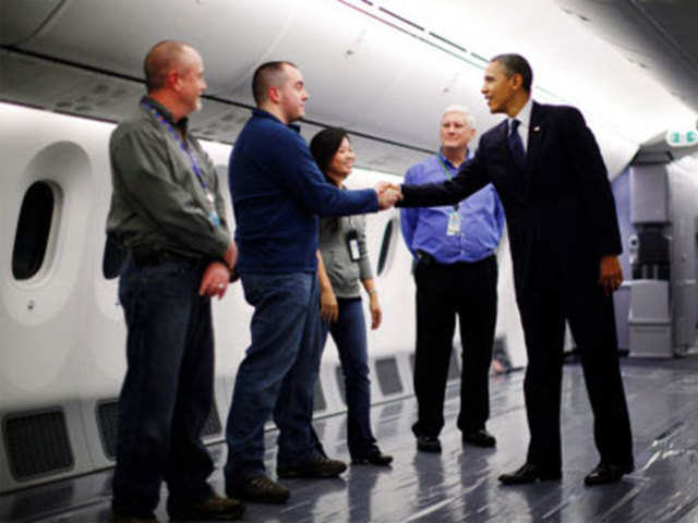 Barack Obama tours the inside of a 787 Dreamliner