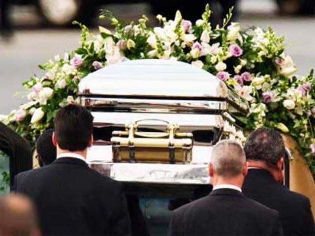 Pall-bearers load casket of pop singer Whitney Houston