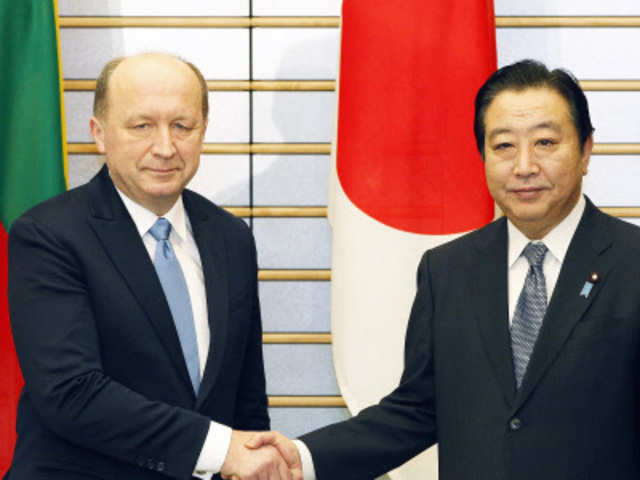 Lithuania's PM shakes hand with Japanese counterpart