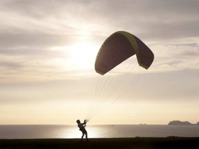 A paragliding instructor in the neighbourhood of Miraflores in Lima