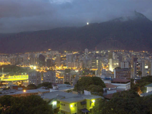 Avila's cross is seen lit on the Avila mountain in Caracas