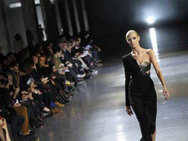 A model presents a creation by Anthony Vaccarello