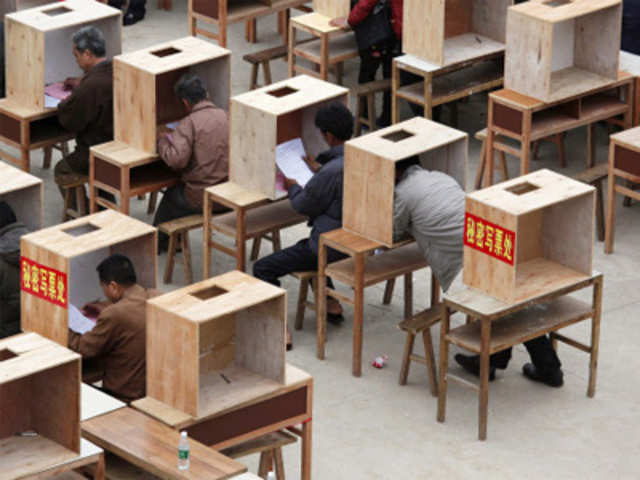 Villagers vote during an election in Wukan, China