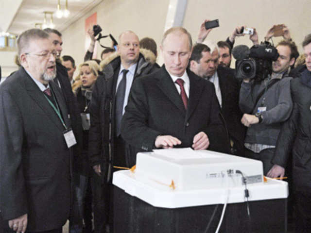 Russian elections: Vladimir Putin casts his vote  