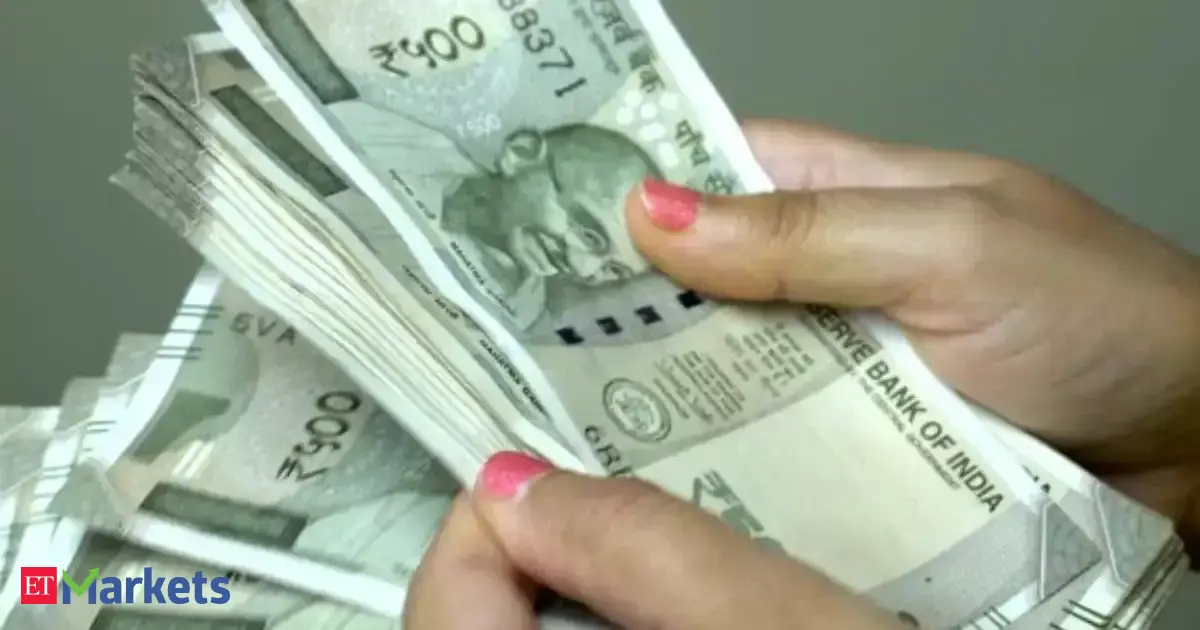 Rupee ends a tad lower, month-end importer dollar bids weigh