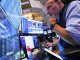 Wall Street ends mixed amid cooling Middle East tensions; Powell in focus
