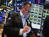Nasdaq, S&P 500 close lower, weighed by tech stocks, Dow ends up