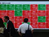 Japan's Nikkei edges lower as tariff stalemate weighs