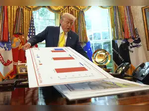 Trump's new tariffs go into effect as US economy shows signs of strain ...