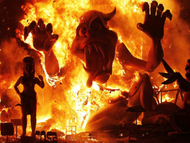 Effigies burn during the Fallas festival