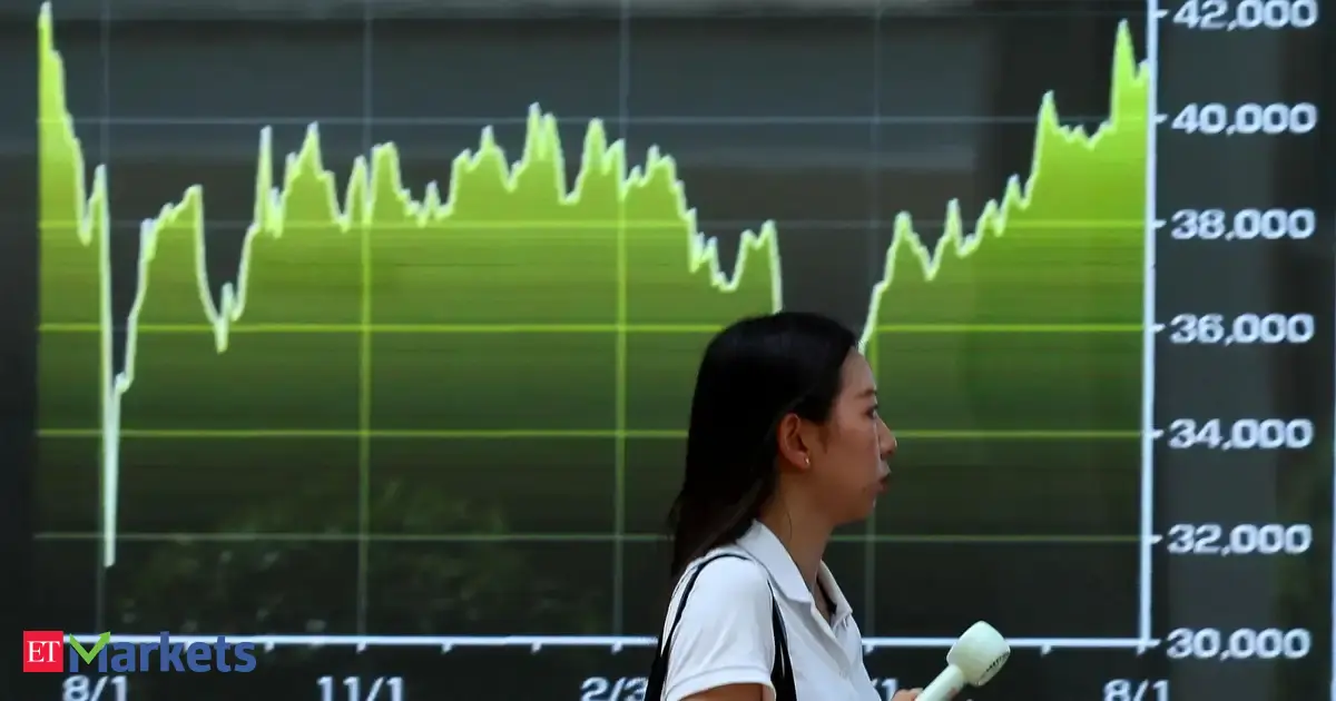 Japan's Nikkei slips from record high, investors weigh Wall Street lull
